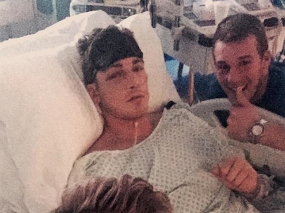 Nick Blackwell with family member at his bedside (Hennessy Sports)