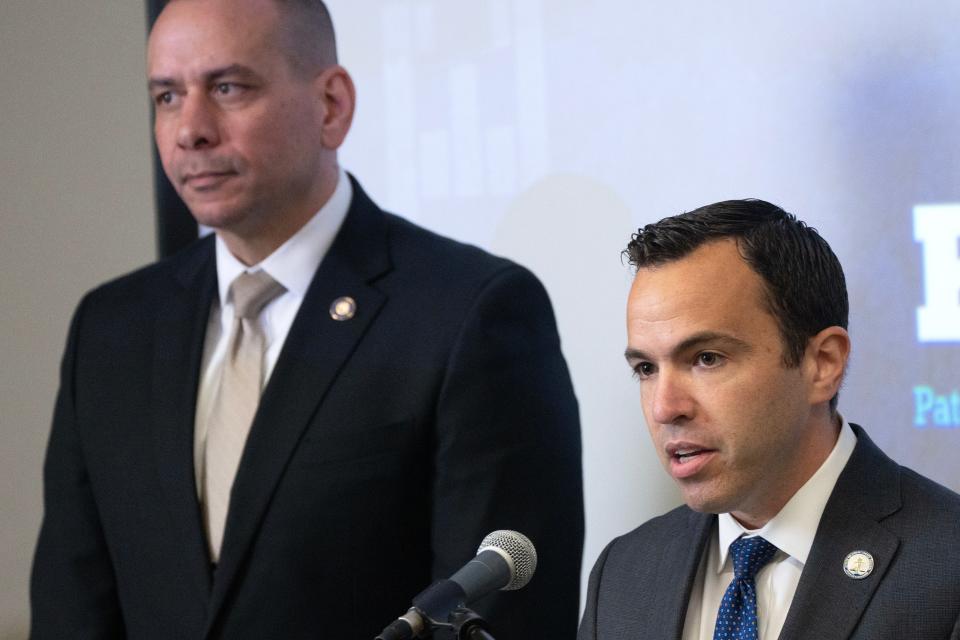 At right, New Jersey Attorney General Matthew J. Platkin introduces Isa M. Abbassi as he assumes the position of Officer in Charge of the Paterson Police Department in Paterson, NJ on Tuesday May 9, 2023. 