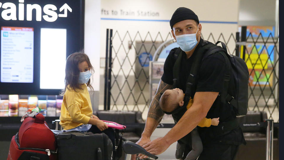 Seen here, Sonny Bill Williams with his two children after arriving in Australia.