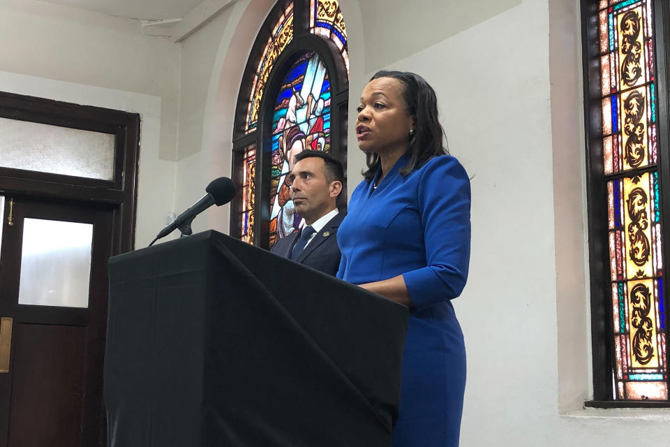 Assistant Attorney General of the U.S. Department of Justice's Civil Rights Division Kristen Clarke, right, speaks next to United States Attorney Martin Estrada, of the California central division, while announcing the largest redlining case in American history during a news conference Thursday, Jan. 12, 2023, at the Second Baptist Church in Los Angeles. (AP Photo/Stefanie Dazio)