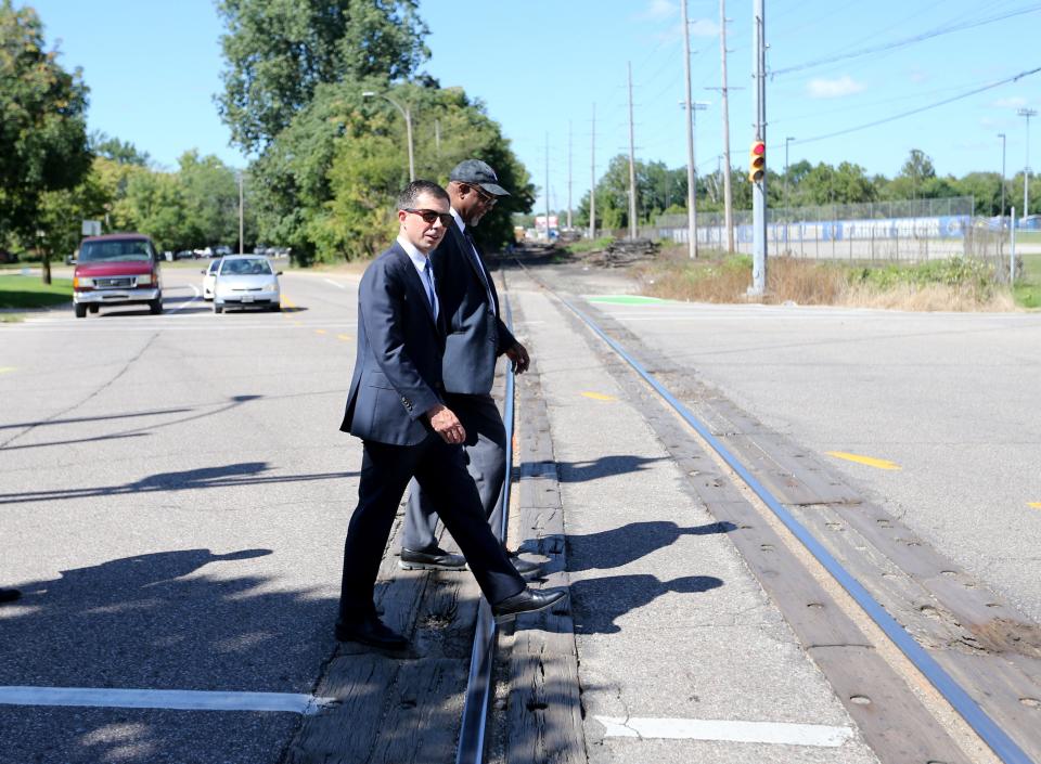 U.S. Secretary of Transportation and former South Bend mayor Pete Buttigieg and Elkhart Mayor Rod Roberson tour the railroad crossing at Richmond Street and Blazer Boulevard on Wednesday, Aug. 30, 2023, during Buttigieg's visit.