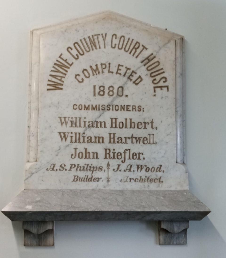 This is the marble tablet in the entryway to the Wayne County Courthouse lobby that has been displayed since the new courthouse was opened in 1880.