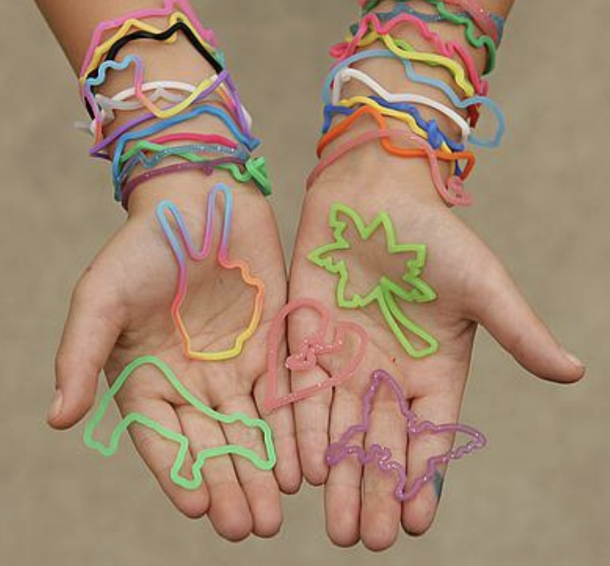 A hand decked in Silly Bandz