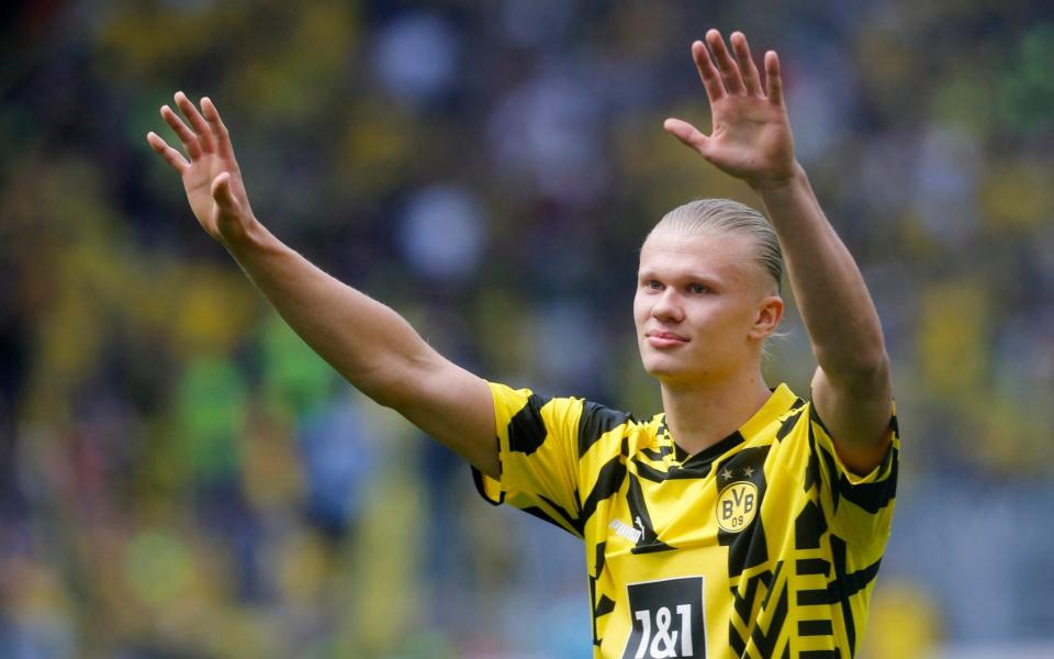 Borussia Dortmund's Erling Braut Haaland says goodbye to the fans before playing his last match - REUTERS