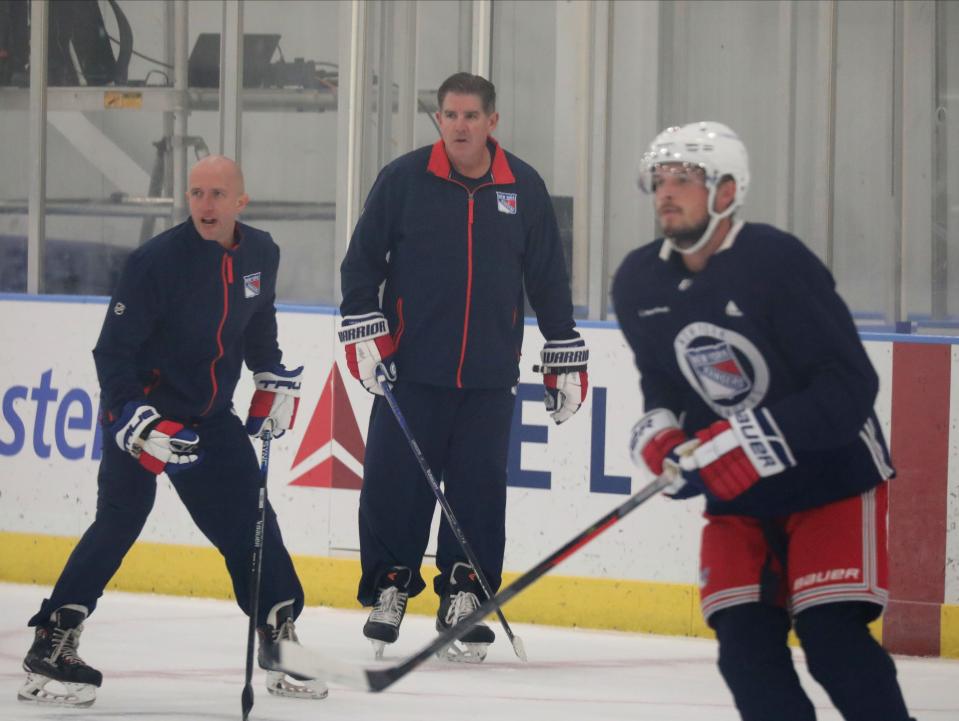New York Rangers head coach Peter Laviolette, center, is pictured during a training session at their facility in Tarrytown, Sept. 22, 2023.