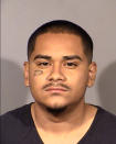 This booking photo provided by Las Vegas Metropolitan Police Department shows Edgar Samaniego, 20, of Las Vegas, following his arrest Tuesday, June 2, 2020, in the shooting of Las Vegas Police Officer Shay Kellin Mikalonis late Monday on the Las Vegas Strip. The shooting happened during one of several violent clashes involving protesters and police during demonstrations over the death of George Floyd in Minneapolis. (Clark County Detention Center/Las Vegas Metropolitan Police Department via AP)