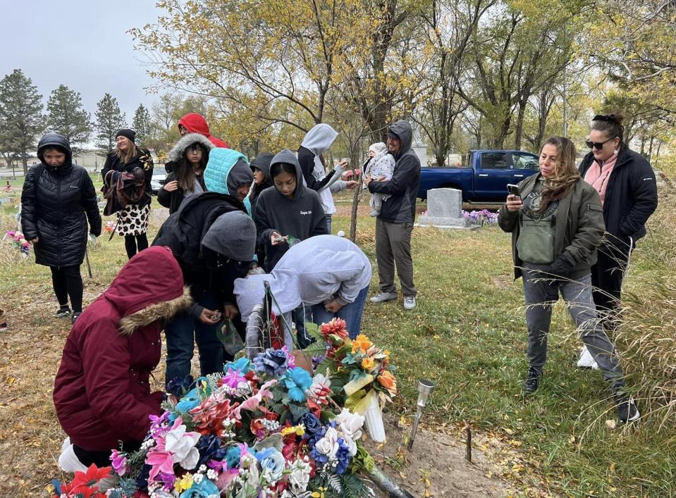 On Oct. 27, 2023, the day that would have been Honor’s 13th birthday, classmates decorated rocks with themes from his life and laid them next to the gravesite while sharing stories and singing “Happy Birthday.”