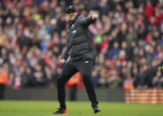 Liverpool's manager Jurgen Klopp celebrates at the end of the English Premier League soccer match between Liverpool and Bournemouth at Anfield stadium in Liverpool, England, Saturday, March 7, 2020. Liverpool won 2-1. (AP Photo/Jon Super)