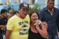 <p>Relatives of victims of the Boeing 737 plane that crashed after taking off from Havana’s main airport yesterday, arrive to a hotel in Havana, Cuba, May 19, 2018. (Photo: Alexandre Meneghini/Reuters) </p>