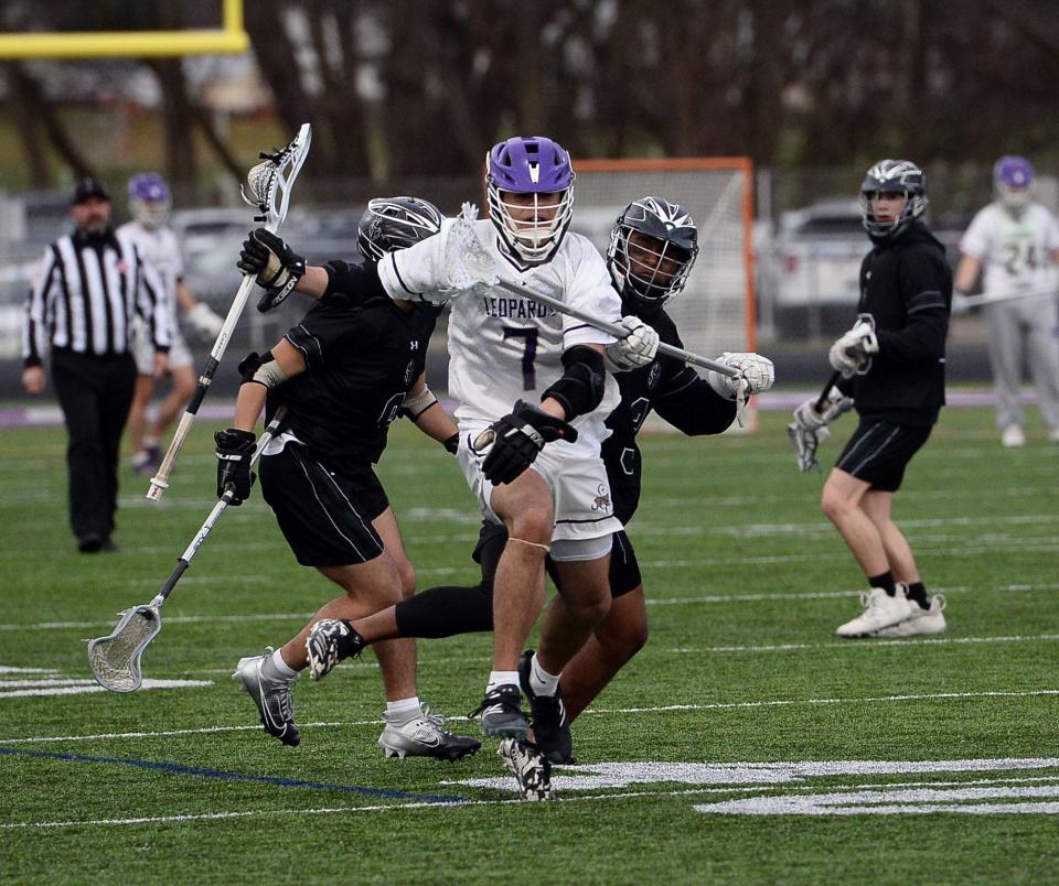 Smithsburg's Ayden Weakfall breaks through Tuscarora's defense during the Leopards' 6-3 victory. Weakfall scored four goals in the game.