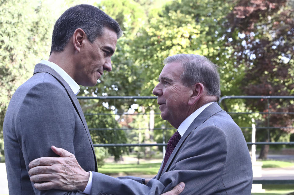 In this photo provided by the Spanish government in Madrid, Spain's Prime Minister Pedro Sanchez, left greets exiled Venezuelan opposition leader Edmundo Gonzalez at the Moncloa Palace in Madrid, Thursday Sept. 12, 2024. (Fernando Calvo, Spanish Government via AP)