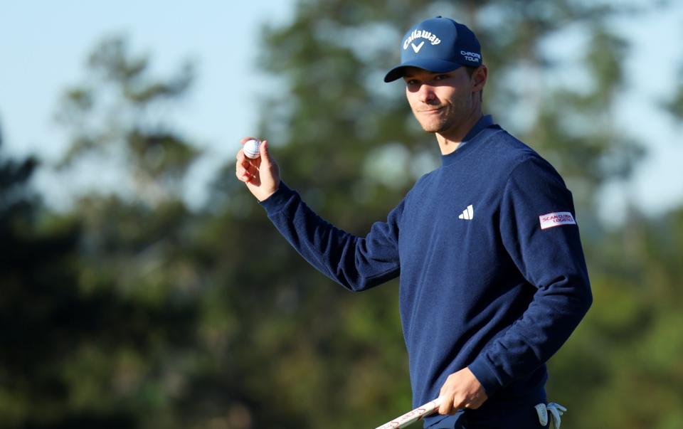 Nicolai Hojgaard acknowledges the crowd after finishing his first round