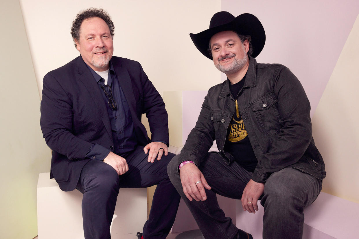 ANAHEIM, CALIFORNIA - SEPTEMBER 10: (L-R) Jon Favreau and David Filoni pose at the IMDb Official Portrait Studio during D23 2022 at Anaheim Convention Center on September 10, 2022 in Anaheim, California. (Photo by Corey Nickols/Getty Images for IMDb)