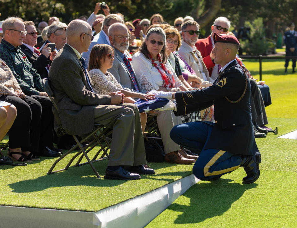 Family members of Lt. William McGowan attend his burial ceremony at the Normandy American Cemetery on July 8, 2022. / Credit: Courtesy of ABMC