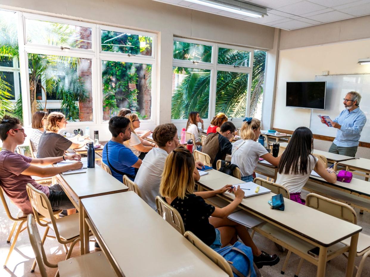 Classroom with teacher and white board