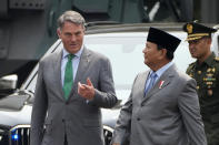 Australia's Deputy Prime Minister and Defense Minister Richard Marles, left, talks with Indonesian Defense Minister Prabowo Subianto upon arrival for their meeting in Jakarta, Indonesia, Monday, June 5, 2023. (AP Photo/Dita Alangkara)