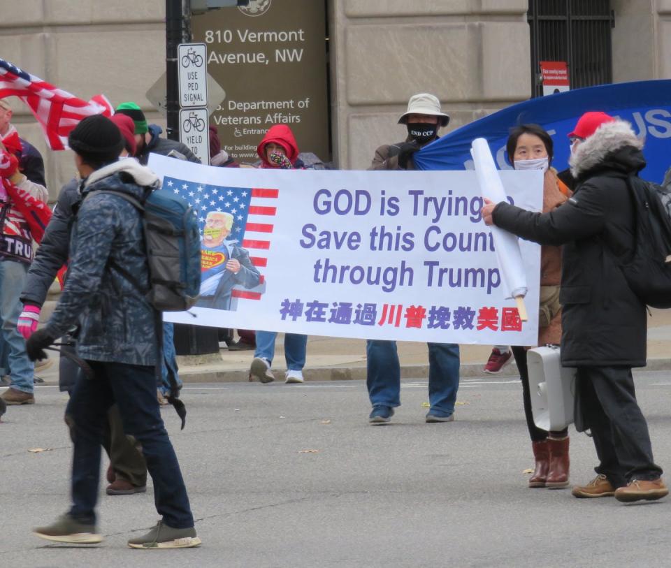Banners invoked God and praised Donald Trump on Jan. 6, 2021. Gregory Starrett, <a href="http://creativecommons.org/licenses/by-nd/4.0/" rel="nofollow noopener" target="_blank" data-ylk="slk:CC BY-ND;elm:context_link;itc:0;sec:content-canvas" class="link ">CC BY-ND</a>