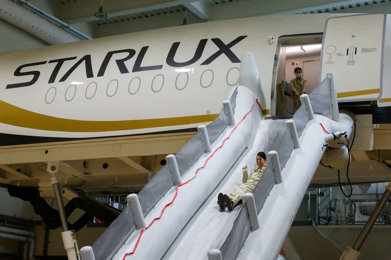 Starlux flight attendants receive emergency landing and slide trainings at their center in Taoyuan