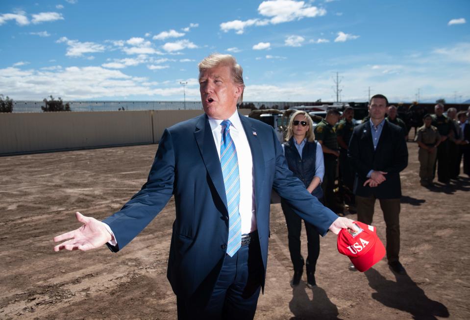 President Donald Trump tours the border wall between the United States and Mexico in Calexico, California, on April 5, 2019.