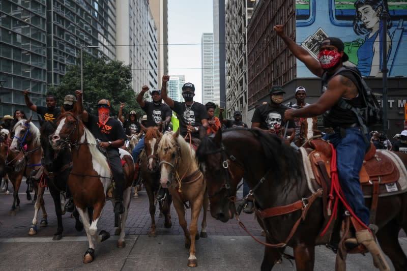Protesters on horseback rally against death in Minneapolis police custody of George Floyd, in Houston