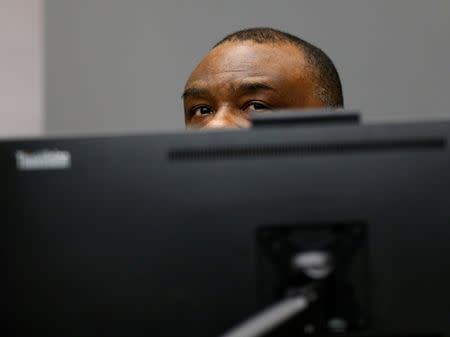Jean-Pierre Bemba Gombo of the Democratic Republic of the Congo sits behind a monitor in the courtroom of the International Criminal Court (ICC) in The Hague, June 21, 2016. REUTERS/Michael Kooren