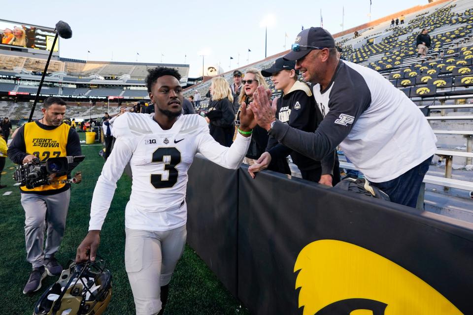 Purdue wide receiver David Bell (3) celebrates with fans after an NCAA college football game against Iowa, Saturday, Oct. 16, 2021, in Iowa City, Iowa. Purdue won 24-7. (AP Photo/Charlie Neibergall)