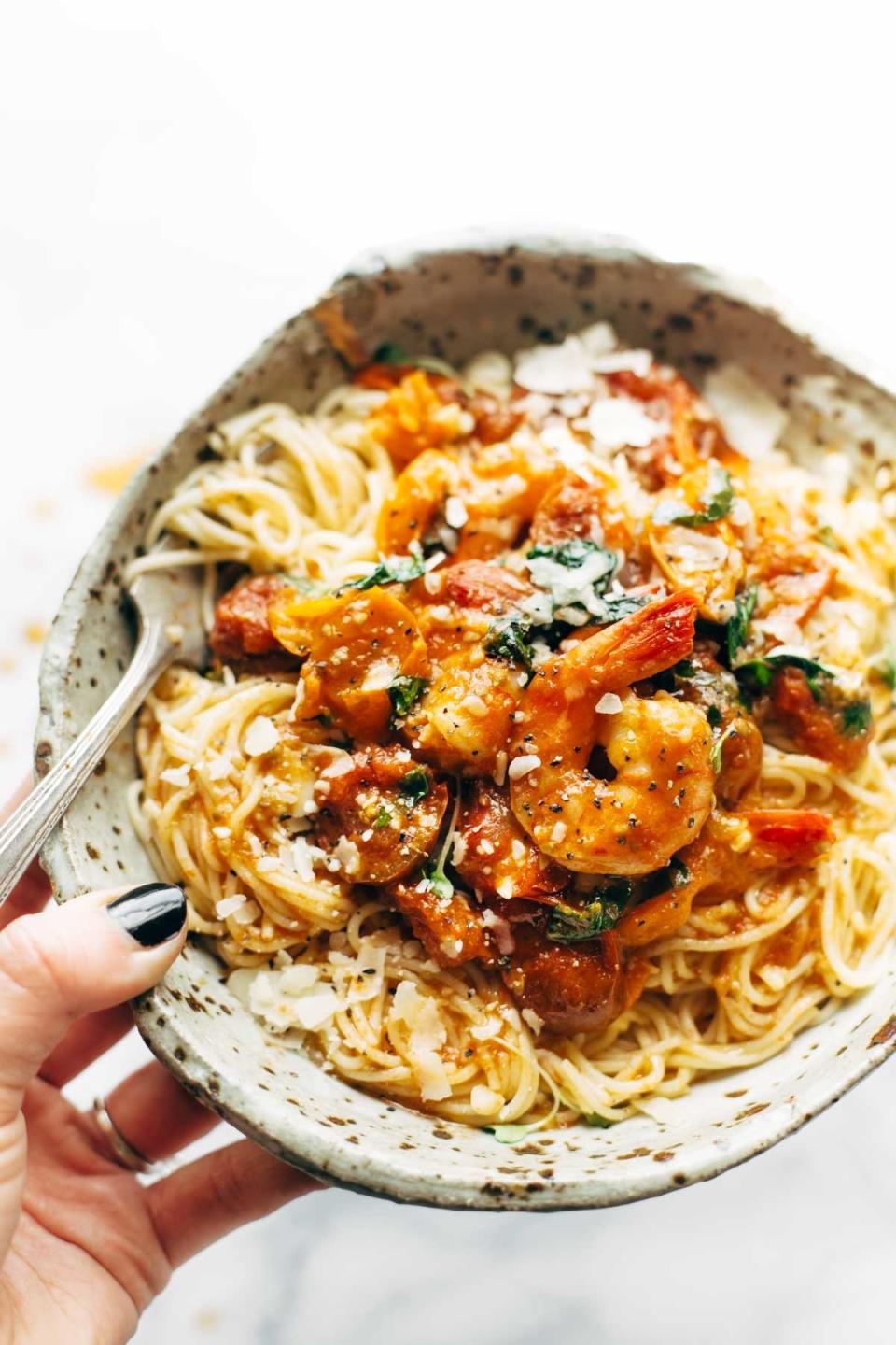 Garlic Butter Capellini Pomodoro With Shrimp in a bowl