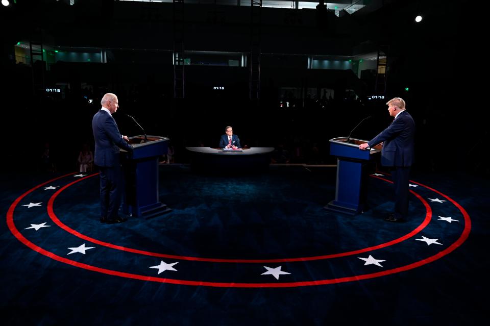 President Donald Trump and Democratic presidential candidate former Vice President Joe Biden participate in the first presidential debate Tuesday, Sept. 29, 2020, at Case Western University and Cleveland Clinic, in Cleveland, Ohio. (Olivier Douliery/Pool vi AP) ORG XMIT: OHJE305