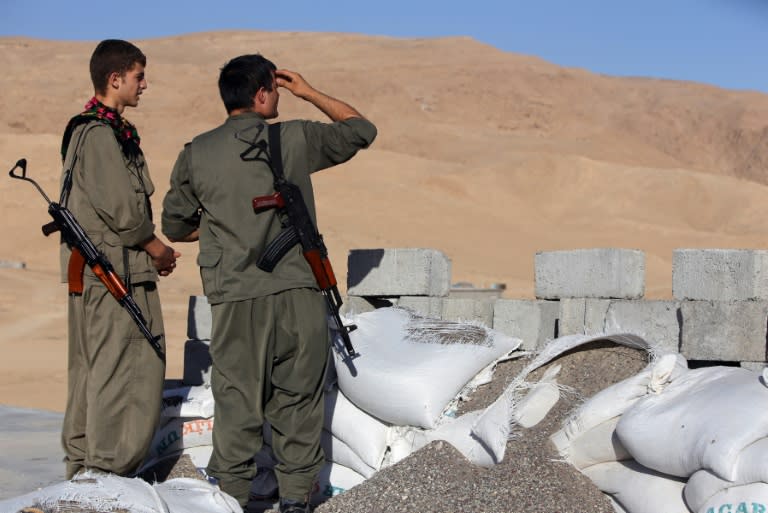 File picture shows Kurdistan Workers Party (PKK) fighters guarding a position in the town of Makhmur, southwest Arbil, the capital of the autonomous Kurdish region of northern Iraq