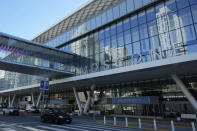 Part of the skyline is reflected in windows at the Moscone Center in San Francisco, Wednesday, Oct. 18, 2023. A $4 million marketing campaign touting San Francisco's resilience, innovation and moxie launches Thursday, Oct. 19, as the embattled city prepares to host a high-profile Asia-Pacific Economic Cooperation leaders' summit next month that could boost its image or pile on to its woes. Much of the APEC summit will be held at the Moscone Center. (AP Photo/Eric Risberg)