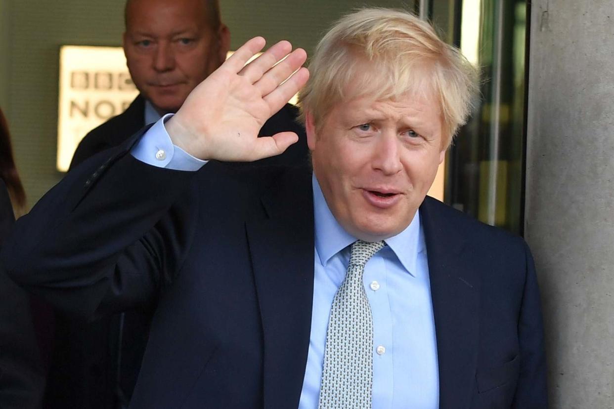 Johnson leaves MediaCityUK in Salford after a BBC interview on Friday: PA