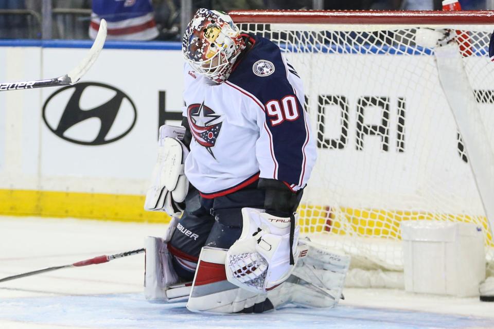 Nov 12, 2023; New York, New York, USA; Columbus Blue Jackets goaltender Elvis Merzlikins (90) reacts after allowing a game tying goal with eleven seconds remains in the third period against the New York Rangers at Madison Square Garden. Mandatory Credit: Wendell Cruz-USA TODAY Sports