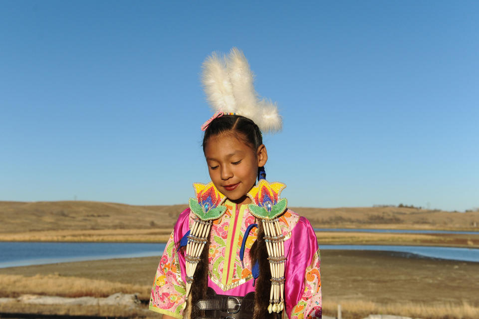 <p>PJ Herrera, 10, poses for a photograph during a protest against the Dakota Access pipeline near the Standing Rock Indian Reservation near Cannon Ball, North Dakota, U.S. November 12, 2016. (Photo: Stephanie Keith/Reuters) </p>