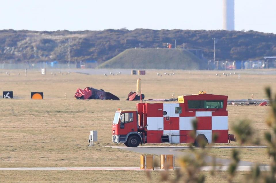 The scene after the jet crashed at an RAF base in Wales on Tuesday (PA)