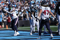 Houston Texans running back Dameon Pierce (31) celebrates his touchdown against the Carolina Panthers during the first half of an NFL football game, Sunday, Oct. 29, 2023, in Charlotte, N.C. (AP Photo/Erik Verduzco)