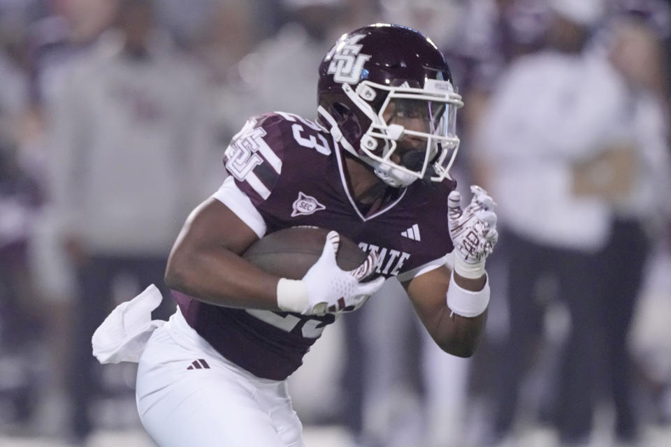 Mississippi State running back Seth Davis runs against Kentucky during the first half of an NCAA college football game in Starkville, Miss., Saturday, Nov. 4, 2023. (AP Photo/Rogelio V. Solis)