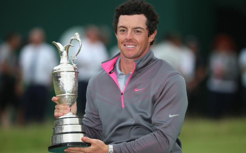 Rory McIlroy of Northern Ireland holds the Claret Jug after his two-stroke victory at The 143rd Open Championship - Getty Images