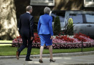 Britain's Prime Minister Theresa May, with her husband Philip May, leaves 10 Downing Street, London for Buckingham Palace, Wednesday, July 24, 2019. Boris Johnson will replace May as Prime Minister later Wednesday, following her resignation last month after Parliament repeatedly rejected the Brexit withdrawal agreement she struck with the European Union. (AP Photo/Matt Dunham)