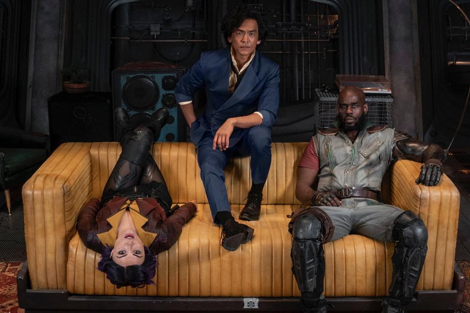 COWBOY BEPOP (L to R) DANIELLA PINEDA as FAYE VALENTINE, JOHN CHO as SPIKE SPIEGEL and MUSTAFA SHAKIR as JET BLACK on the set of COWBOY BEPOP