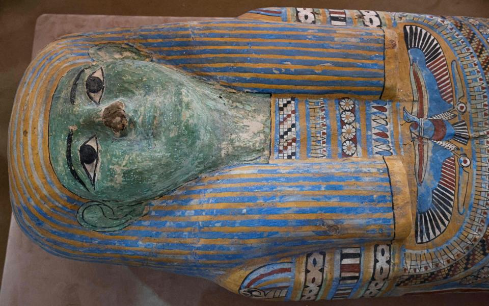 A sarcophagus is unveiled for visitors in the Saqqara necropolis - AFP/KHALED DESOUKI