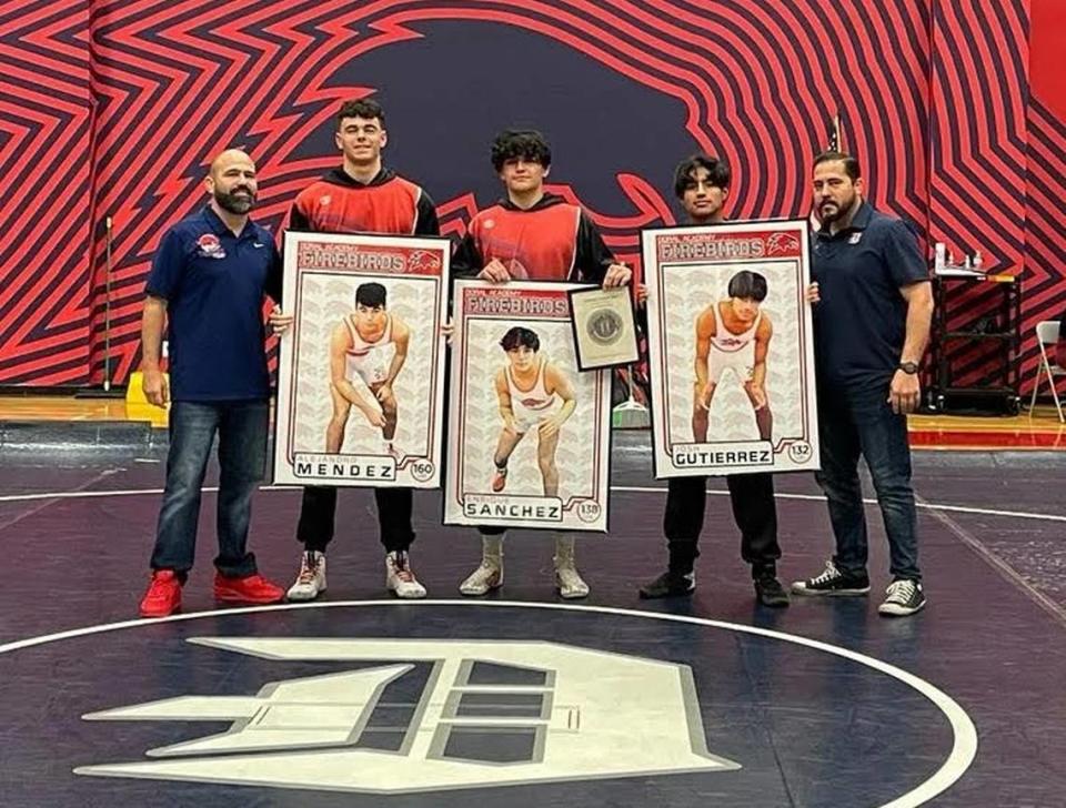 Doral Academy honored senior wrestlers Alejandro Mendez, Enrique Sanchez and Josh Gutierrez.