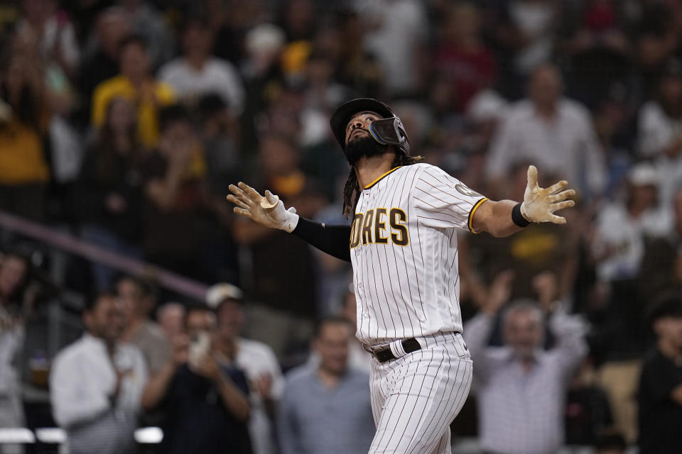San Diego Padres' Fernando Tatis Jr. celebrates after hitting a home run during the fourth inning of a baseball game against the Philadelphia Phillies, Tuesday, Sept. 5, 2023, in San Diego. (AP Photo/Gregory Bull)