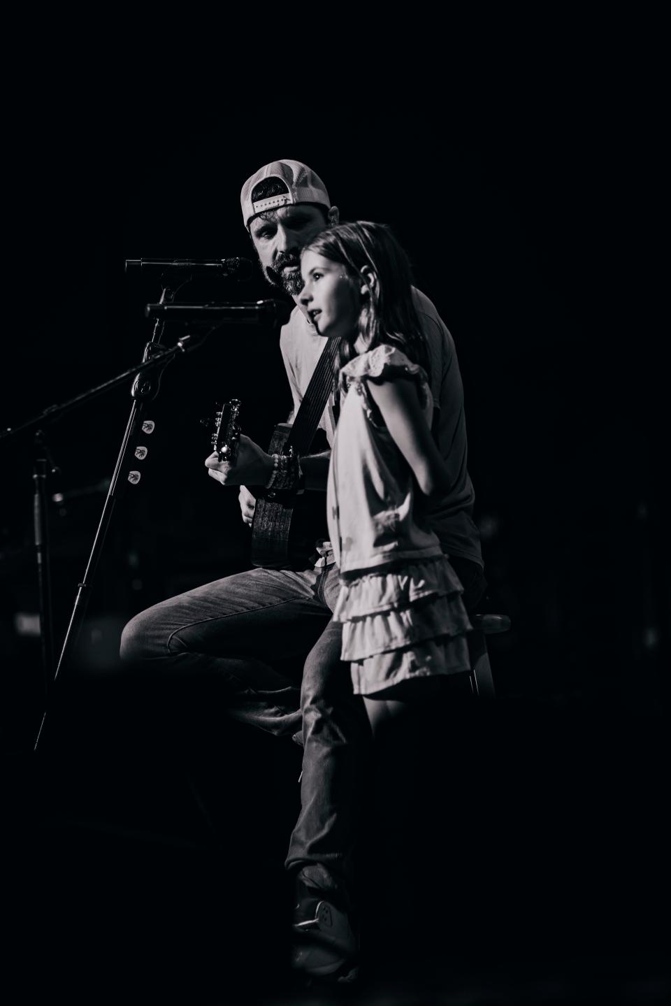 Walker Hayes and his daughter Loxley on June 9, 2023, in Jacksonville, Fla., during a performance of "If Father Time Had a Daughter"