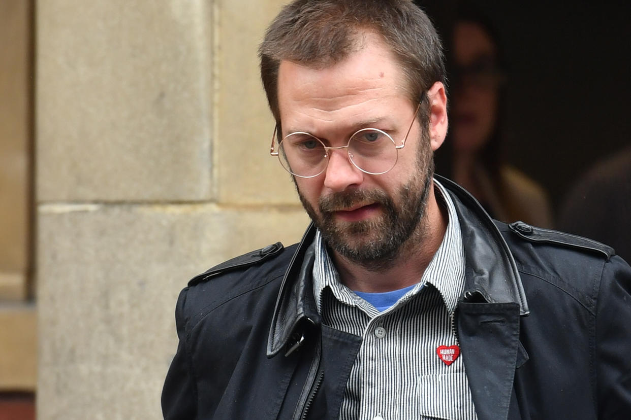 Ex-Kasabian singer Tom Meighan leaving Leicester Magistrates' Court where he was sentenced to carry out 200 hours of unpaid work for assaulting former fiancee Vikki Ager.