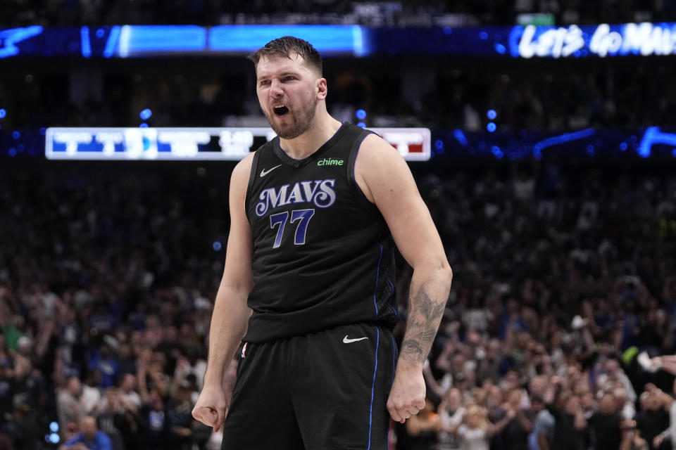 Dallas Mavericks' Luka Doncic celebrates after sinking a basket in the second half of Game 6 of an NBA basketball second-round playoff series against the Oklahoma City Thunder Saturday, May 18, 2024, in Dallas. (AP Photo/Tony Gutierrez)