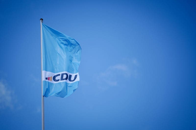 A flag with the CDU logo flies in the wind on top of the Konrad Adenauer House, the Christian Democratic Union (CDU) headquarters. A new opinion poll in Germany ahead of June's European Parliament elections show the centre-right opposition bloc of the Christian Democratic Union (CDU) and its Bavarian sister party, the Christian Social Union (CSU), well ahead of Chancellor Olaf Scholz's coalition government. Kay Nietfeld/dpa