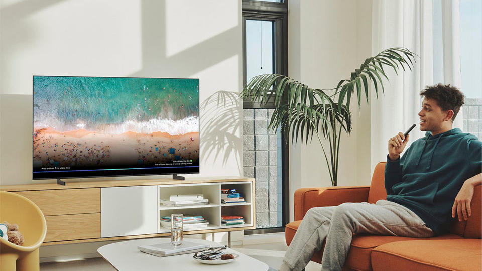 Man watching Samsung Q60B QLED TV