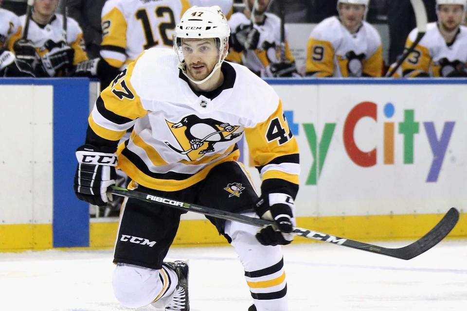 <p>Bruce Bennett/Getty Images</p> Adam Johnson pictured with playing for Pittsburgh Penguins against the New York Rangers at Madison Square Garden on March 25, 2019