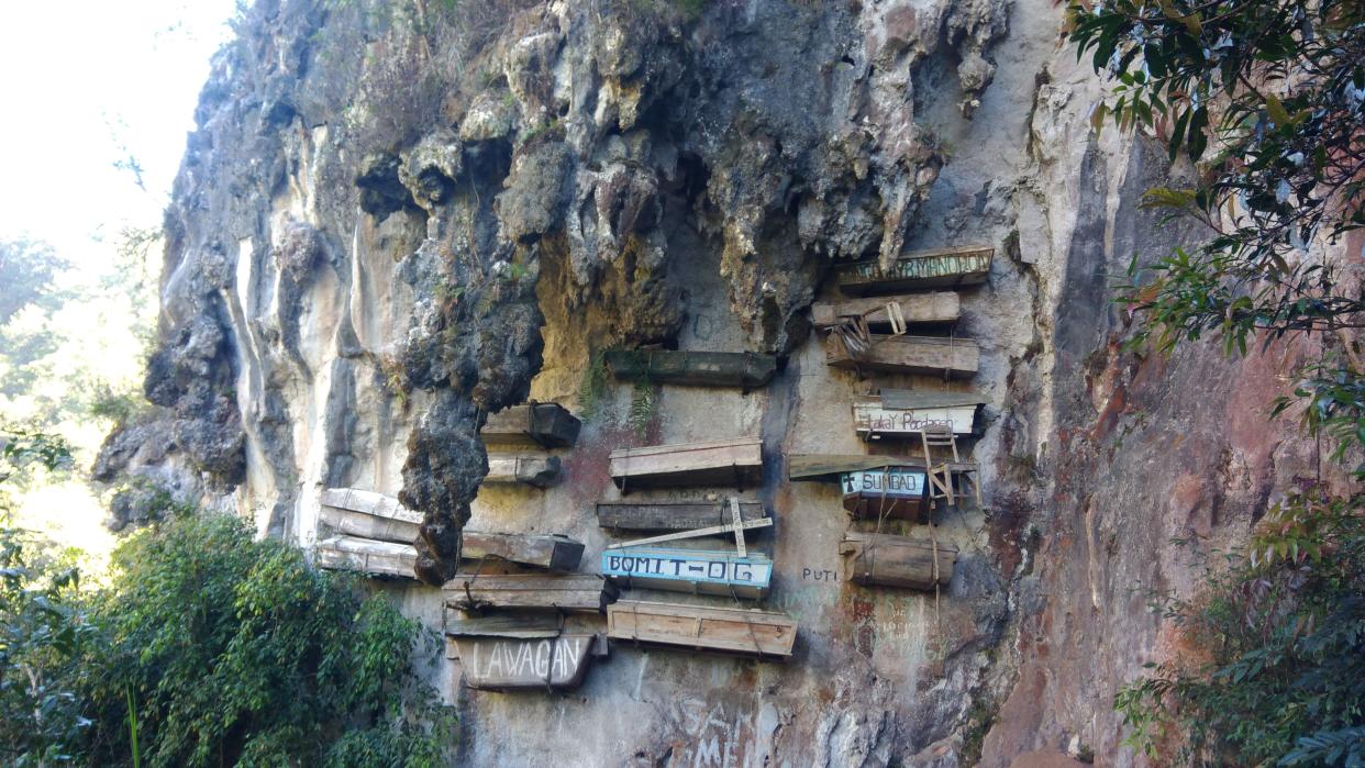 Philippines coffins hang from cliffs