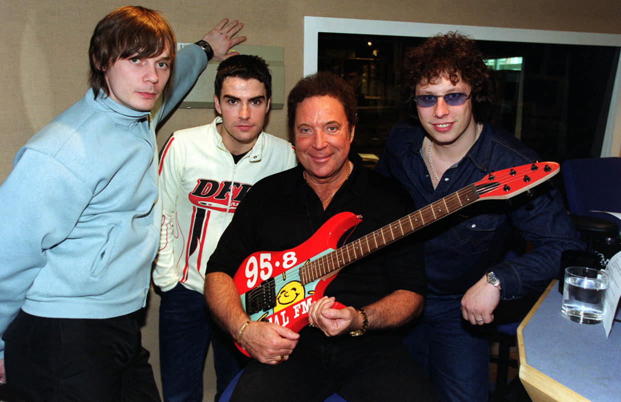 Welsh music stars, pop legend Tom Jones, (centre right), with members of the band Stereophonics, (l/r) Richard Jones, Kelly Jones, and Stuart Cable, after pre-recording a show at the Capital FM studios, Leicester Square, London.